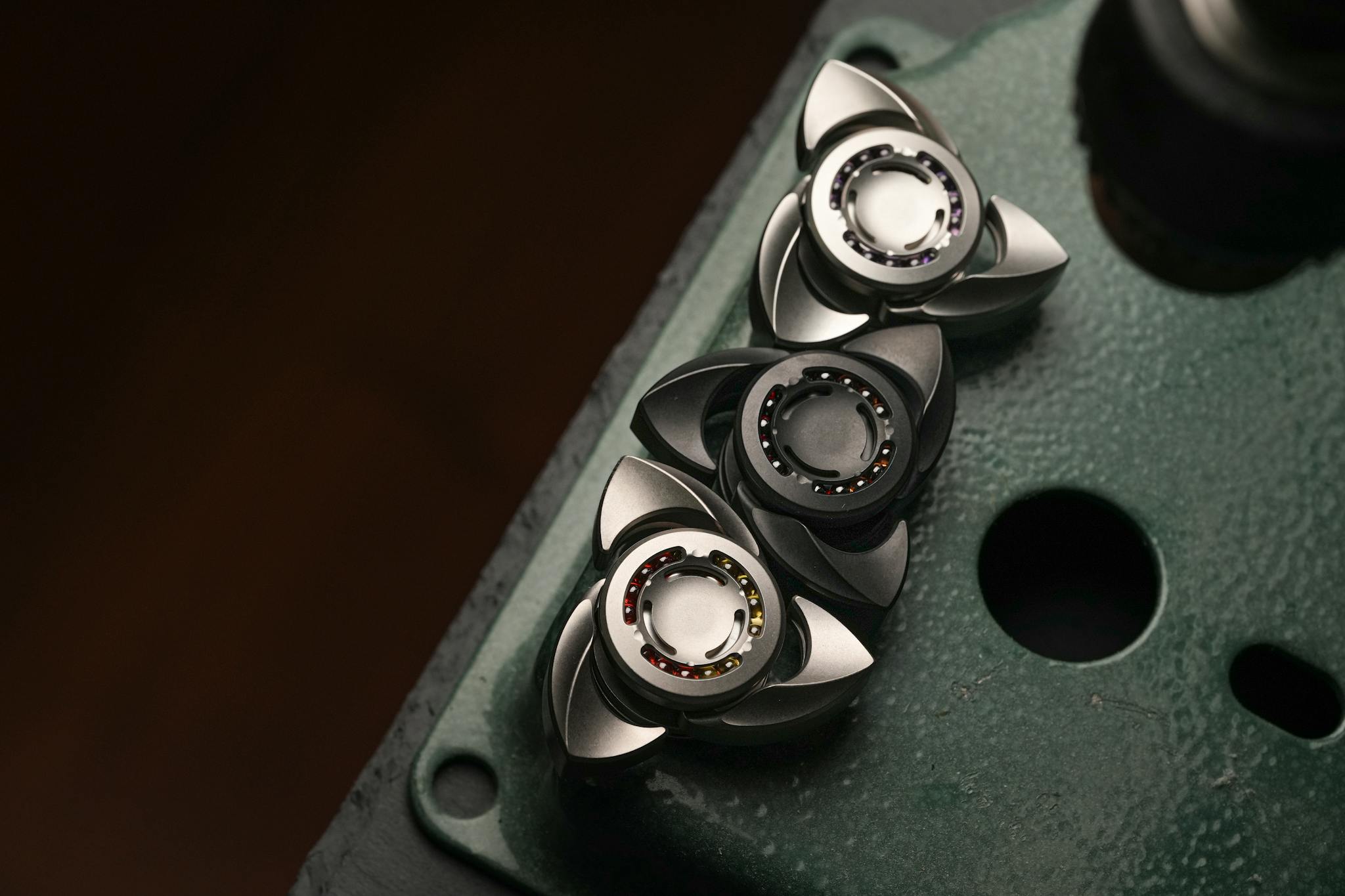 High-quality image of precision-engineered metal tool components showcased on a textured surface.